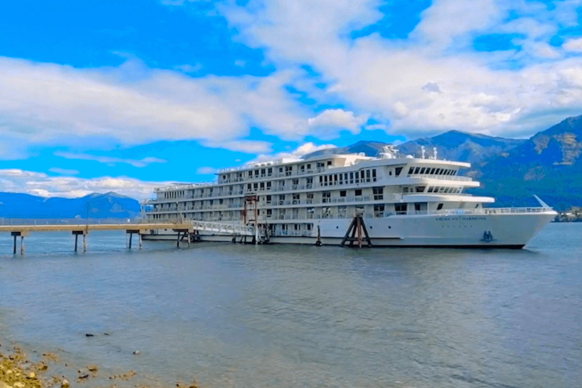 American Harmony riverboat docked along the Columbia River