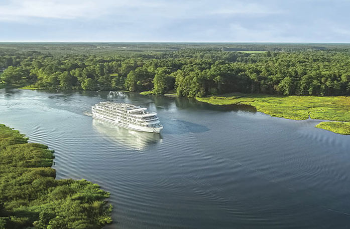 American Cruise Lines ship cruising the Mississippi River