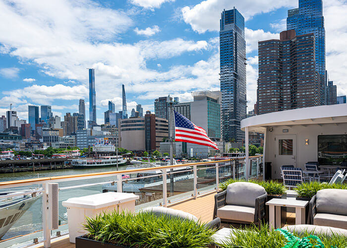 The New York City skyline from the deck of a American Cruise Lines ship.