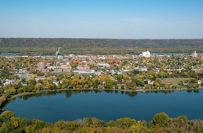 Aerial view of the Mississippi River with the city of Winona in the distance.