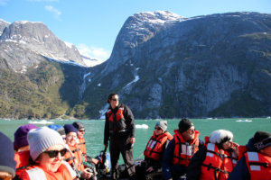 ADC-Skiff passengers with guide explore Tracy Arm, Alaska