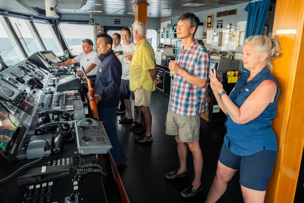 Guests onboard visiting the ship's bridge