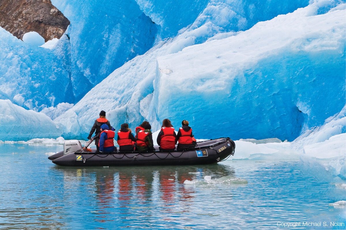 LEX-Guests from the Lindblad Expeditions ship National Geographic Sea Bird during Zodiac operations in Tracy Arm, Southeast Alaska