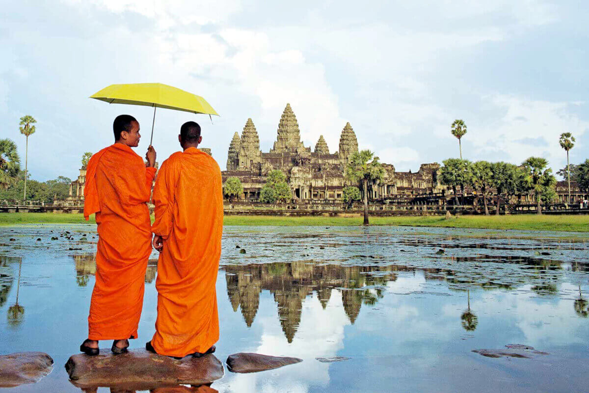 Two monks facing Angkor Wat, Cambodian