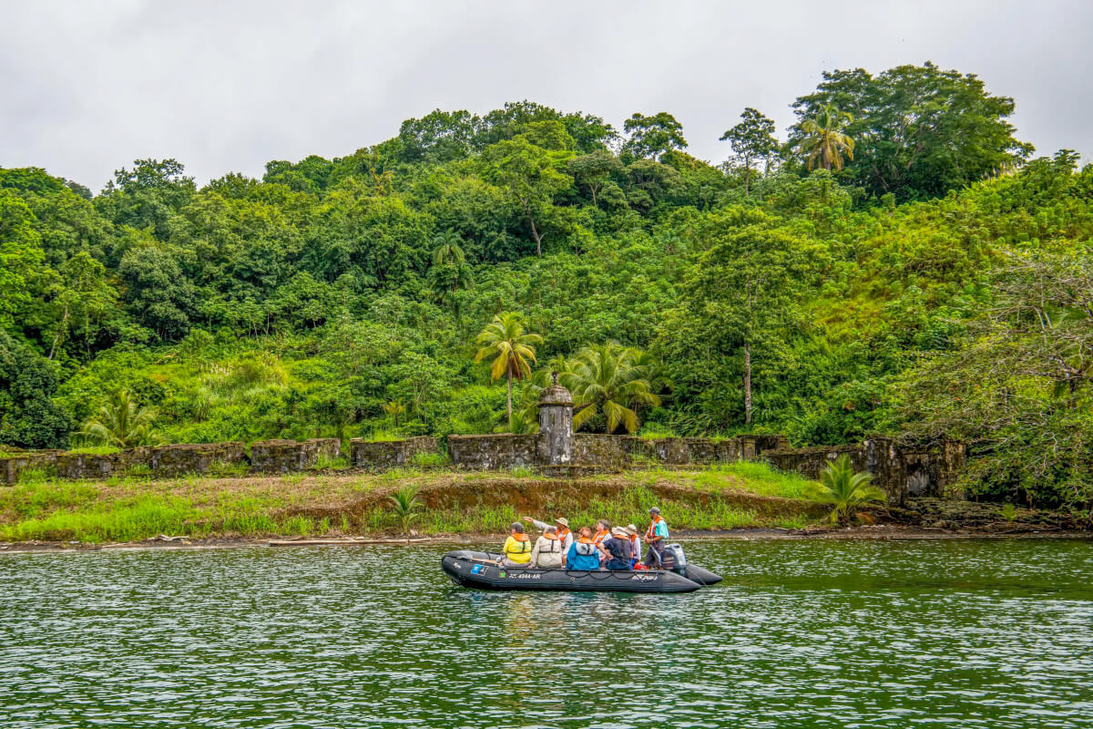 Zodiac fill with guests sailing along the Darien jungle