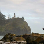 Coastline of Astoria, Washington, with lighthouse on a cliff
