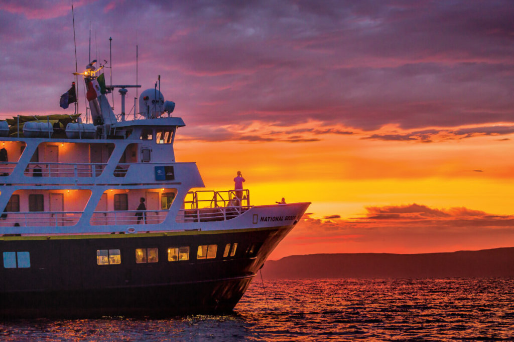 The Lindblad Expeditions ship National Geographic Sea Lion at sunset off Isla Ildefonso, Baja California Sur, Mexico