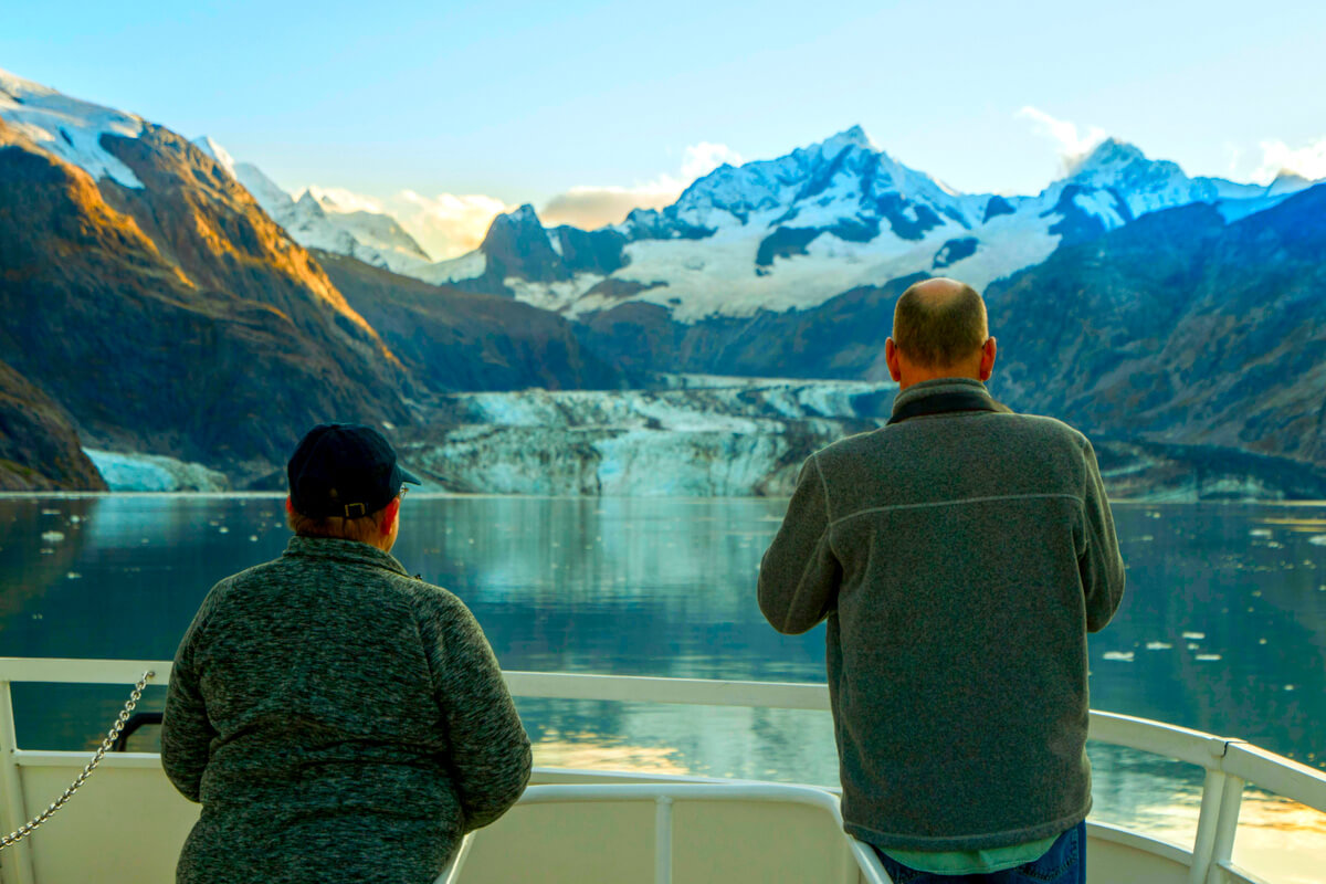 Couple gazing at an Alaskan glacier