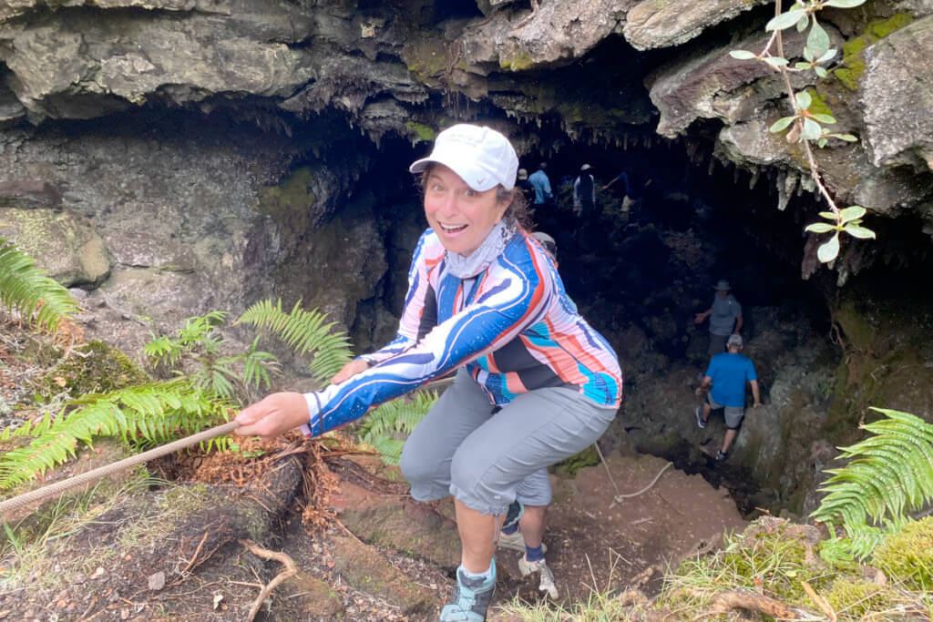 Cruise guest appearing from a cave