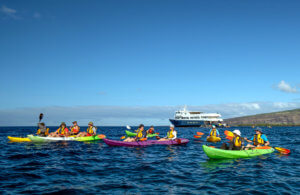 Guests kayaking near Safari Explorer