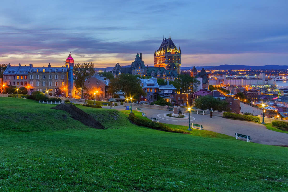 Fairmont Le Château Frontenac, standing over Québec City, Québec at dusk