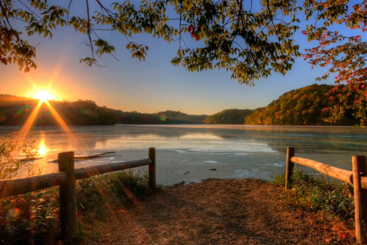 A river scene at sunrise